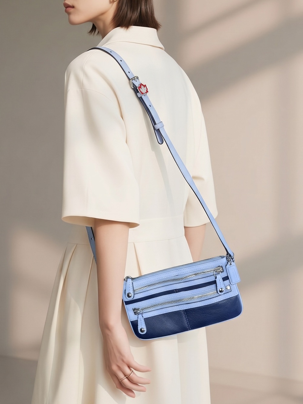 Coach Two-Tone Light Blue and Navy Leather Mini Crossbody Bag